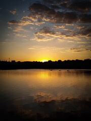 Obraz premium sunset over the river