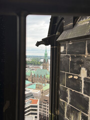 View of Hamburg City Hall through Gothic cathedral architecture