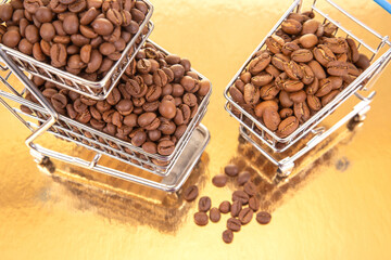 Roasted coffee beans in orderly rows on a reflective golden backdrop, emphasizing their warm brown...