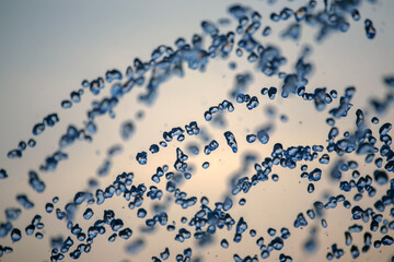 drops of the fountain in the sky