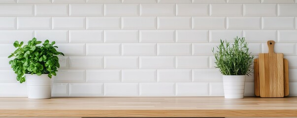 Decluttered home decor idea. Modern kitchen setting with plants and wooden cutting board.