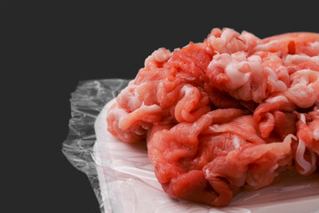 pork scraps. 豚肉のこま切れ