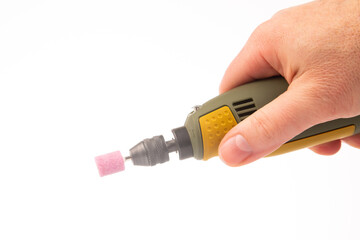 graver and drilling electric tool on a white background. dremel for processing materials and...