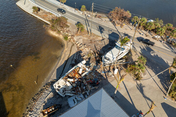 Damaged yachts after hurricane Milton on Manasota Key in Englewood, Florida. Natural disaster...