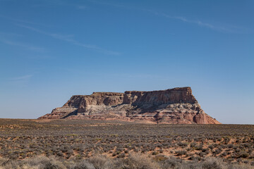 LeChee Rock is a sandstone feature located south of Lake Powell, in Coconino County of northern Arizona. A mesa is an isolated, flat-topped elevation, ridge, or hill. Arizona State Route 98
