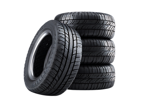 Vibrant photo of stack of five new car tires isolated on transparent background.