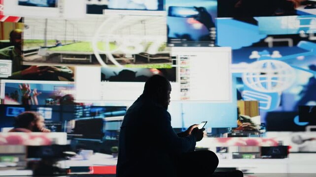 Black male user suffering from mental health issues due to toxic network, illustrating the overwhelming bad impact of internet trends, manipulation and the paranoia of comparison. Camera A.