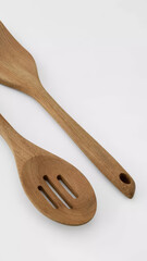 Wooden cooking utensils showcase craftsmanship and functionality in a simple design.