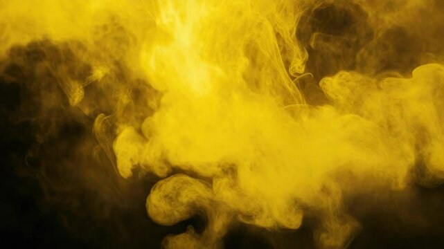 Close up of thick yellow steam or smoke in motion.