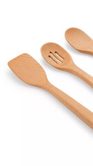 Cooking utensils arranged on a white background, showcasing a spatula, slotted spoon, and solid...