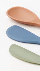 Colorful silicone kitchen utensils displayed together showcasing modern design for cooking and serving.