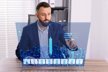 Building information modelling. Man using virtual screen in office