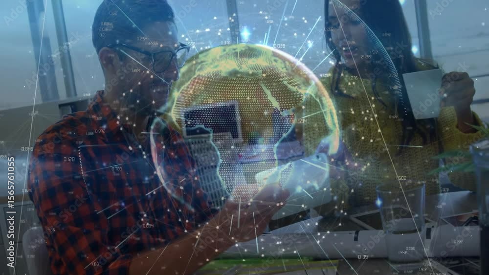 Poster man tapping smartphone showing tech globe overlay while coworker sipping coffee and jotting notes