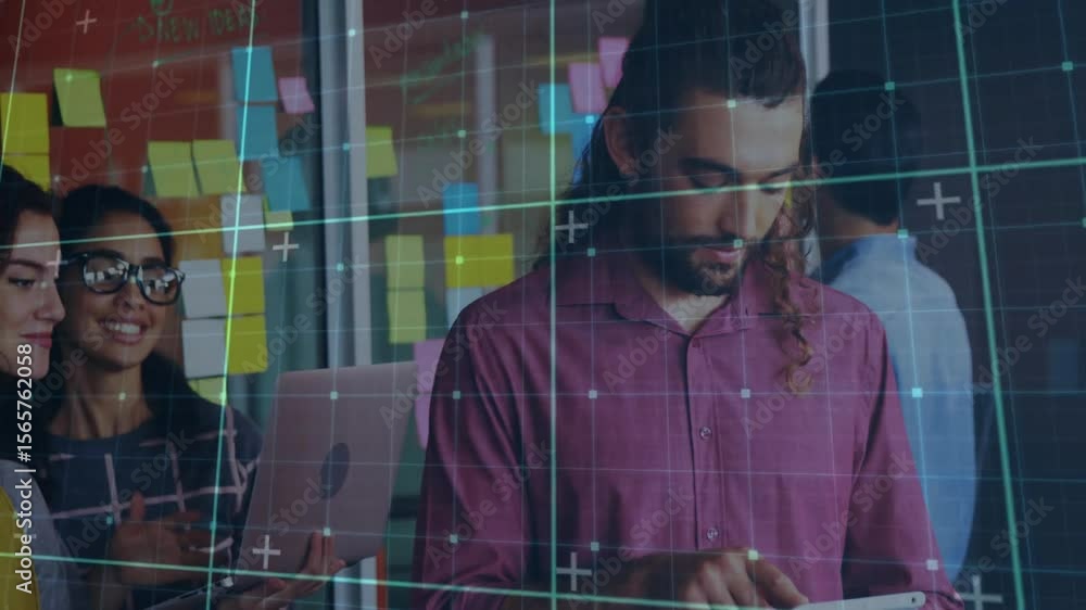 Poster man tapping tablet among sticky notes and initiating grid overlay showing business data insights