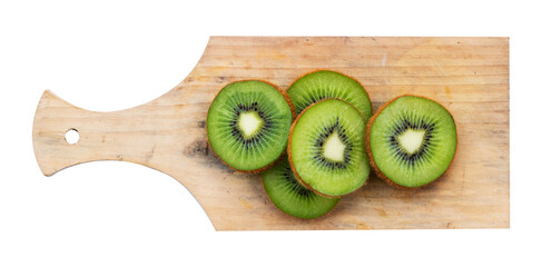 sliced kiwi on wooden cutting board isolated on white
