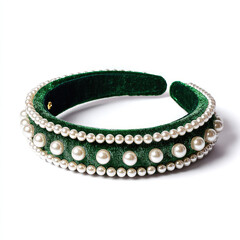 Elegant green velvet headband adorned with pearls on a white background, showcasing fashion accessory trends