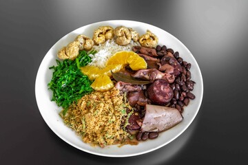 The best traditional Brazilian feijoada completely served in the most authentic style accompanied by the irresistible and iconic cachaça caipirinha