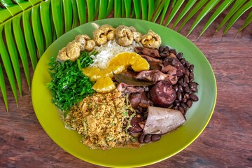 The best traditional Brazilian feijoada completely served in the most authentic style accompanied by the irresistible and iconic cachaça caipirinha