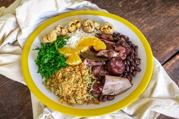 The best traditional Brazilian feijoada completely served in the most authentic style accompanied...