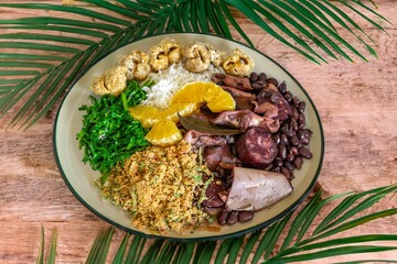 The best traditional Brazilian feijoada completely served in the most authentic style accompanied by the irresistible and iconic cachaça caipirinha