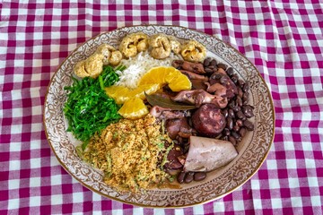 The best traditional Brazilian feijoada completely served in the most authentic style accompanied...