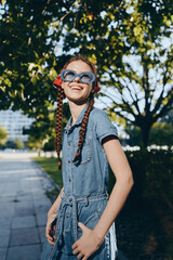 lifestyle woman in modern boho-western denim street style smiling joyfully outdoors with film color...