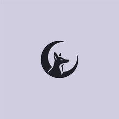 Jackal and moon logo in clean and mystical silhouette design.