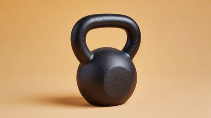 Fototapeta premium Black Kettlebell Isolated on a Simple Background for Home Gym Fitness Equipment, Strength Training, Exercise, Weightlifting, and Physical Health Needs