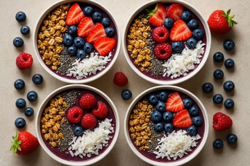 Colorful superfood smoothie bowl arrangement with fresh berries acai and granola photographed from above in natural lighting