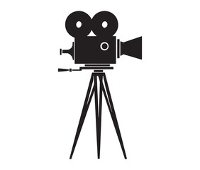 Obraz premium Silhouette of an old movie camera on a tripod. Vintage movie camera on tripod silhouette.