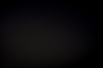 A study in darkness and minimalism, a monochromatic photograph.