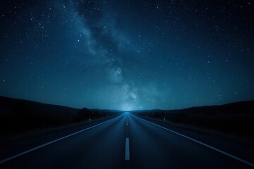 Empty urban asphalt road stretching into distance under starry night sky creating atmospheric scene for travel and adventure themes