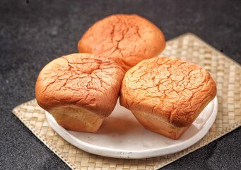 Breudher or Bluder, also known as Brueder or Bloeder (pronounced as broo-dhuh), is a traditional Sri Lankan Dutch Burgher buttery yeast cake, baked in a fluted mould. A variation, Bleuda, Kueh Bleuda
