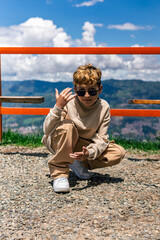Smiling Colombian boy in a natural setting, concept of childhood, diversity and emotional...