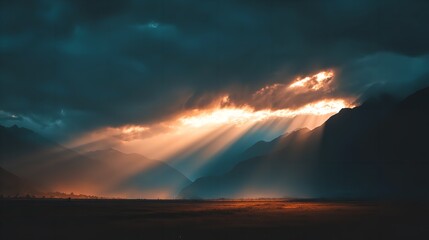 Beams of golden sunlight pierce through dramatic storm clouds illuminating a majestic mountain range during a surreal