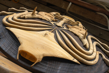 varnished headpiece, stylized mask, collage of marine animals, natural wood, handmade, teak
