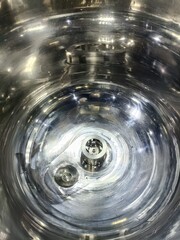 Close-up photo of a bottom mount homogenizer.