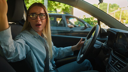 Caucasian woman driver car automobile auto transport vehicle quarrel conflict road traffic jam...