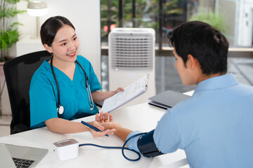 Blood pressure, man and doctor in office with discussion, help and advice for hypertension. Clinic,...