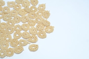 isolated white background original Indonesian raw crackers, uncooked crackers, usually used as an ingredient for making seblak