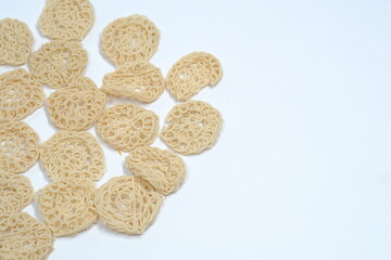 isolated white background original Indonesian raw crackers, uncooked crackers, usually used as an ingredient for making seblak