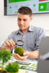 businessman and Sustainable of Green ecology and environment concept. ESG as environmental, social...