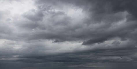 The dark sky weighed down by dark clouds