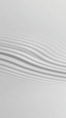 Subtle wavy abstract lines create a flowing pattern on a light grey background
