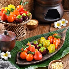 Luk chup, or Luk Coop also spelled look choop, is a type of Thai dessert derived from marzipan, a recipe from Portugal, called massapão