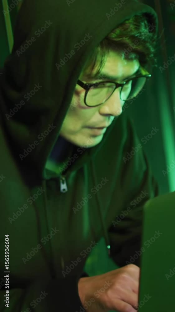 Poster animation of networks of connections over asian male hacker with laptop by computer servers