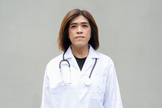 Transgender non binary doctor with stethoscope