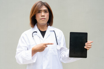 Transgender non binary doctor with stethoscope