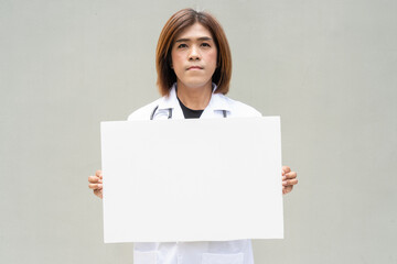 Transgender non binary doctor with stethoscope