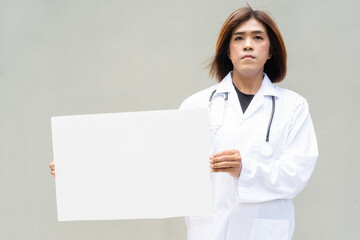 Transgender non binary doctor with stethoscope
